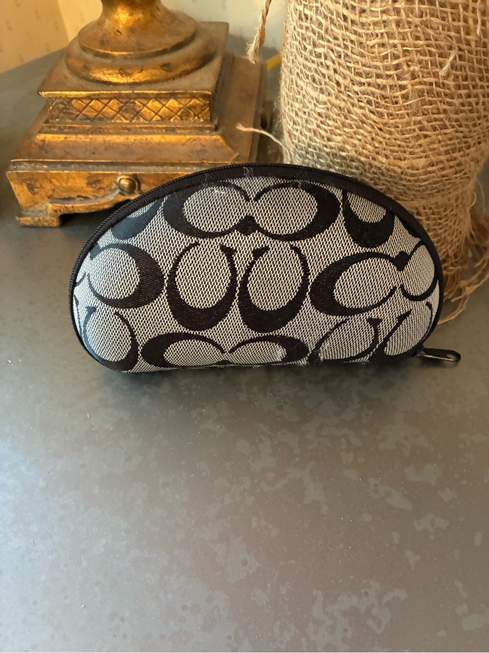 Coach Signature C pattern eye or sunglasses case. Zips, hard shell. 6.5 wide.